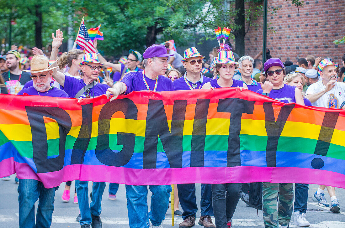 Participants march in the Gay Pride Parade in New York City. The parade is held two days after the U.S. Supreme Court's decision allowing gay marriage in the U.S.