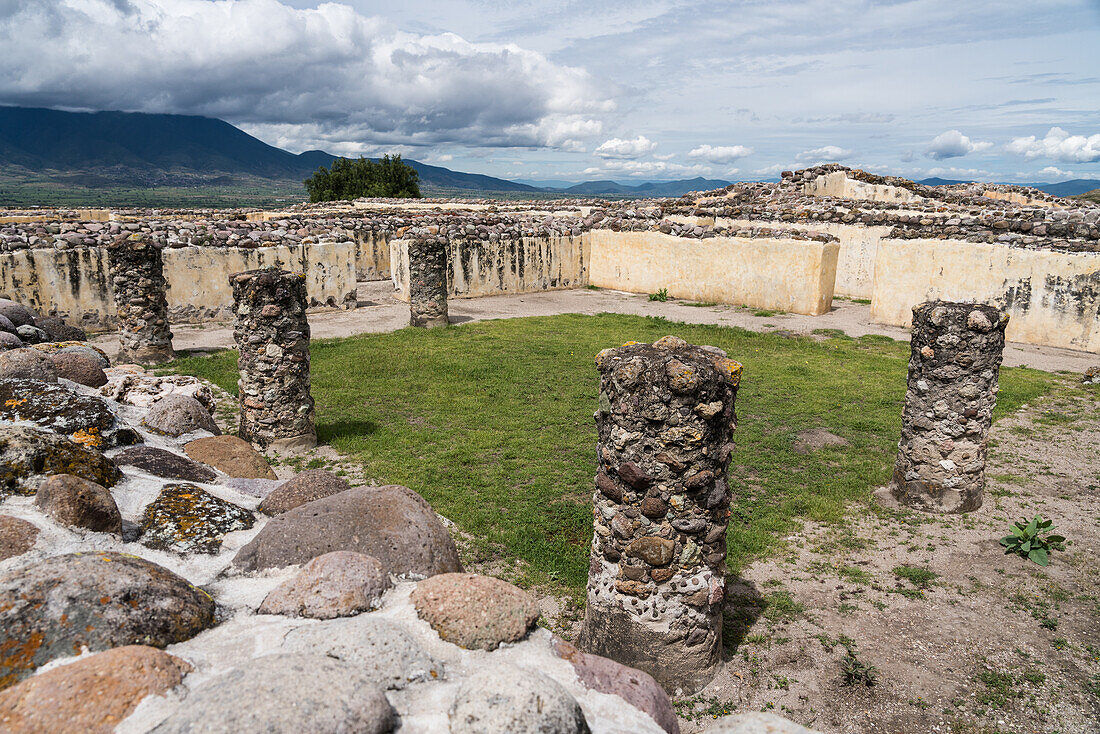 The Palace of the 6 Patios was housing for the elite of Yagul and was built around six grassy patios. The walls were covered with stucco and painted. Yagul, Oaxaca, Mexico.