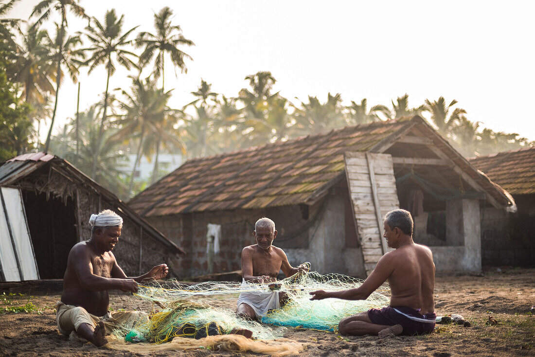 Fishermen at Kappil Beach, Varkala, Kerala, India