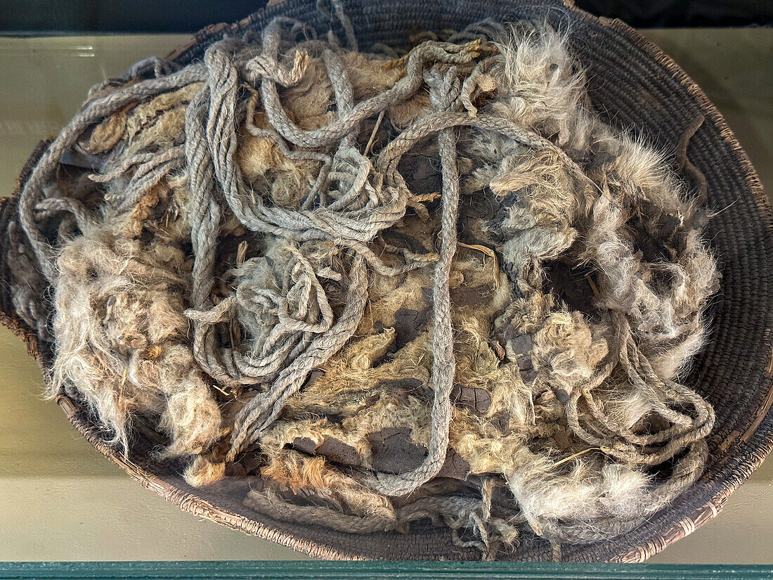The mummy of an infant wrapped in wool cords in a basket in the Calingasta Archeological Museum In Calingasta, Argentina.