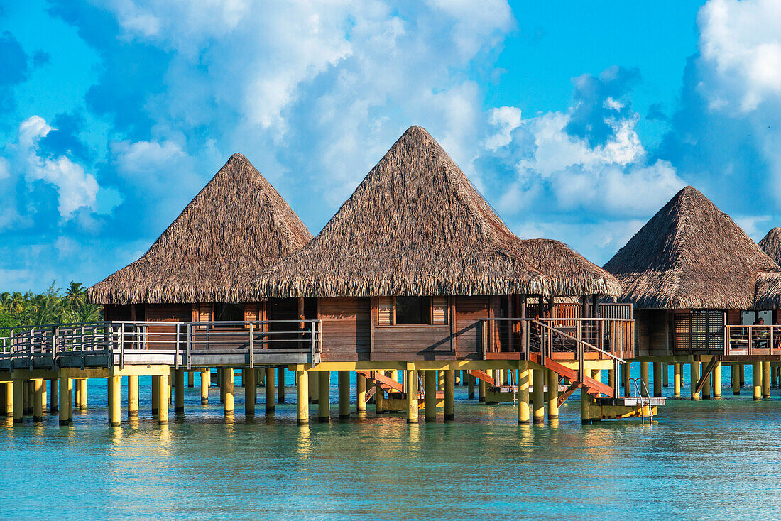 Overwater bungalows of the Luxury Hotel Kia Ora Resort & Spa on Rangiroa, Tuamotu Islands, French Polynesia.