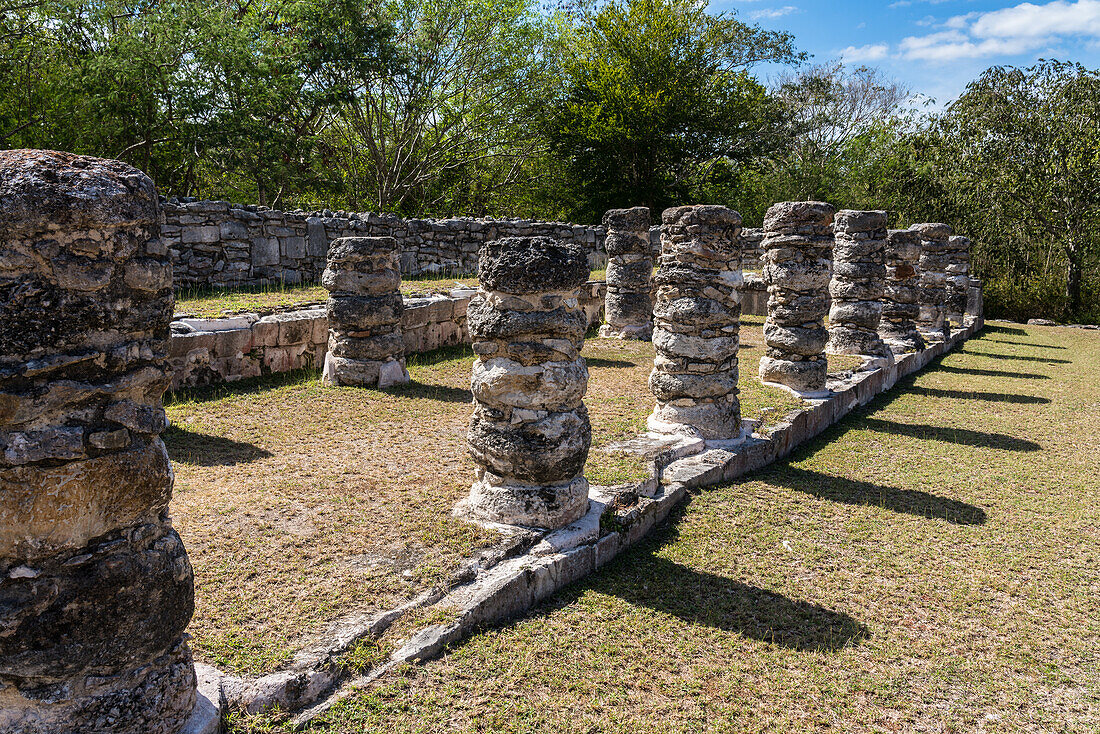 The remaining colonnades of the Room of the Kings in the ruins of the Post-Classic Mayan city of Mayapan, Yucatan, Mexico.
