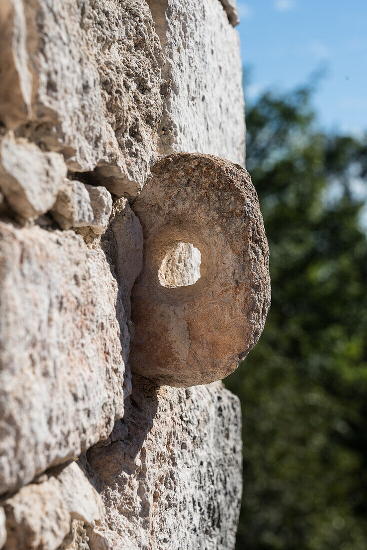 Small stone rings set in the walls of the temples atop Structure 17 or the Twins in the ruins of the pre-Hispanic Mayan city of Ek Balam in Yucatan, Mexico. The structure has two mirroring temples on the top of the pyramid.