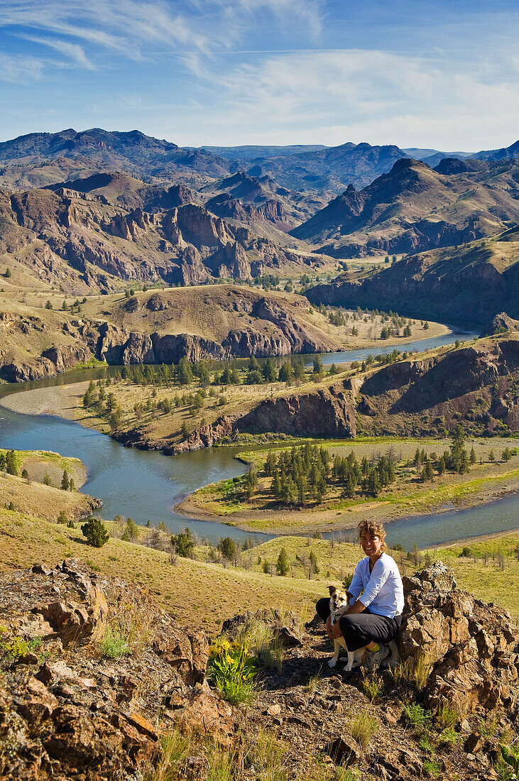 Beth and Maddie enjoy the view on a morning walk; John Day River, Oregon.