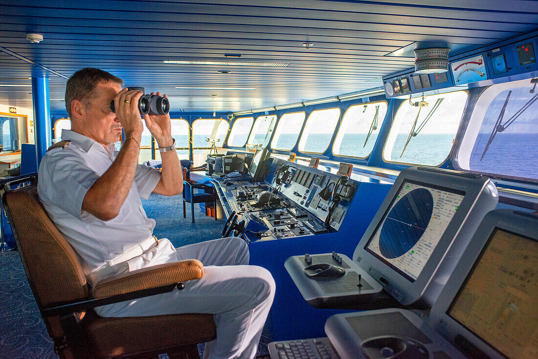 Captain of Paul Gauguin cruise, French Polynesia, Tuamotus Archipelago, Society Islands, South Pacific.