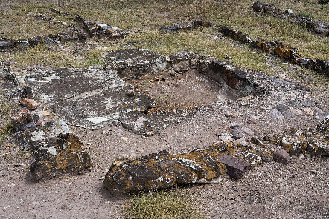 Thr ruins of a temazcal or steam bath in the Zapotec ruins of Lambityeco, Mexico. This was the first steam bath found in the Oaxaca Valley. The entire floor was stone, with the central reservoir having a water pipe coming from outside, under the floor. Hot stones would be placed in the water in the reservoir to make steam.