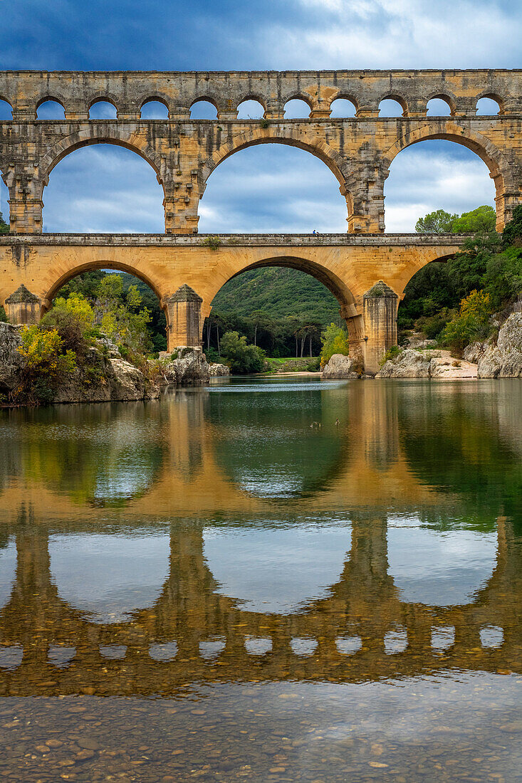 Pont du Gard, Languedoc Roussillon region, France, Unesco World Heritage Site. Roman Aqueduct crosses the River Gardon near Vers-Pon-du-Gard Languedoc-Roussillon with 2000 year old