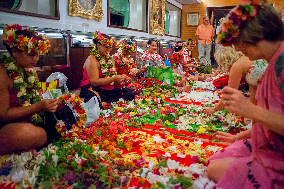 Flowers decoration workshop in the Paul Gauguin cruise ship. France, French Polynesia, Polynesian, South Pacific.