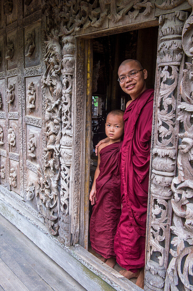 Monks at Shwenandaw Monastery in Mandalay, Myanmar