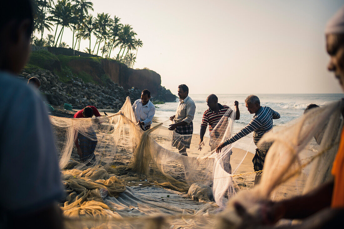 Fishermen at Kappil Beach, Varkala, Kerala, India