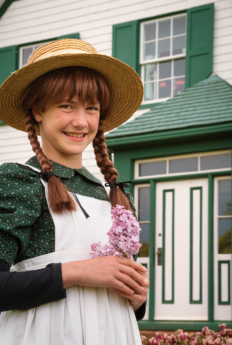 Andrea Hickey posing as Anne of Green Gables at the Green Gables house; Prince Edward Island, Canada.