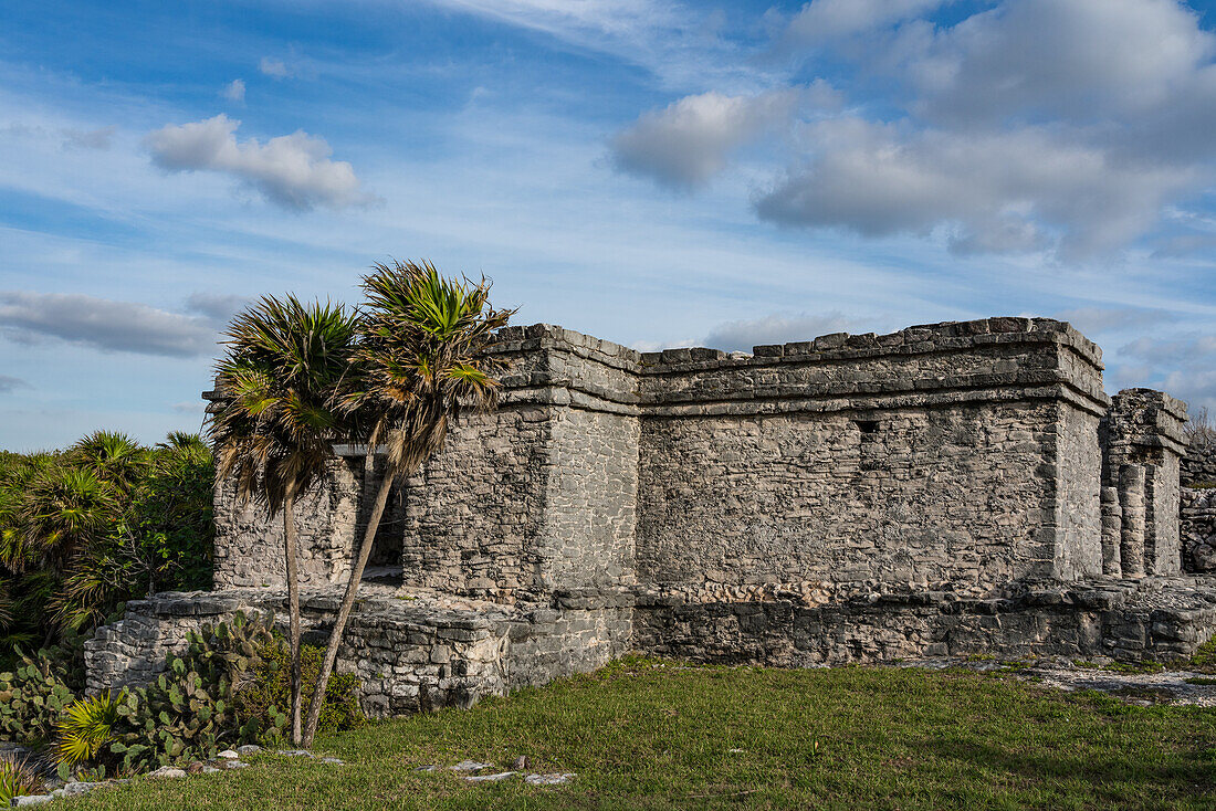 The House of the Cenote in the ruins of the Mayan city of Tulum on the coast of the Caribbean Sea. Tulum National Park, Quintana Roo, Mexico. It is built over a cave or cenote which holds water.