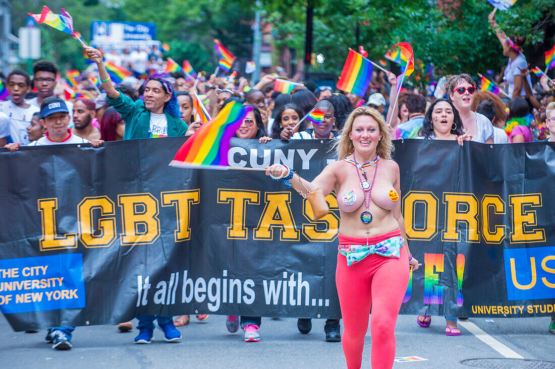 Participants march in the Gay Pride Parade in New York City. The parade is held two days after the U.S. Supreme Court's decision allowing gay marriage in the U.S.