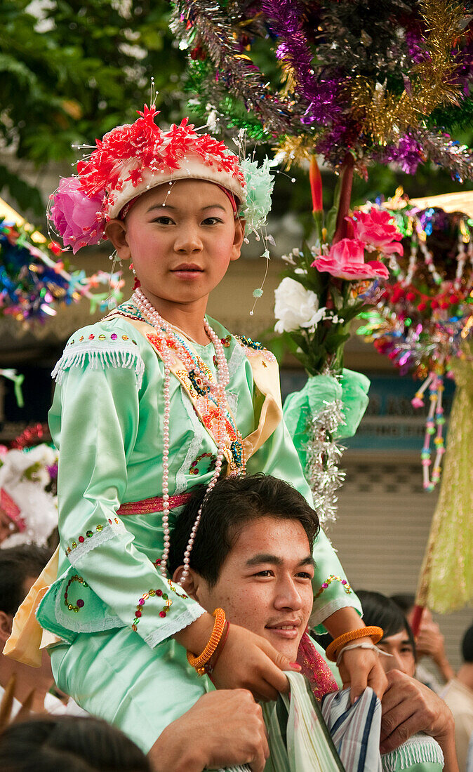 Procession and ceremony for young boys about to become novice monks by the Shan people of Burma at Wat Khun Thwong Buddhist temple in Chiang Mai, Thailand.