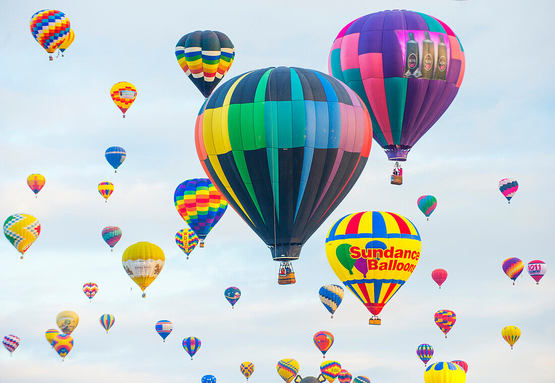 Balloons fly over Albuquerque , New Mexico during Albuquerque balloon fiesta. It’s the biggest balloon event in the the world.