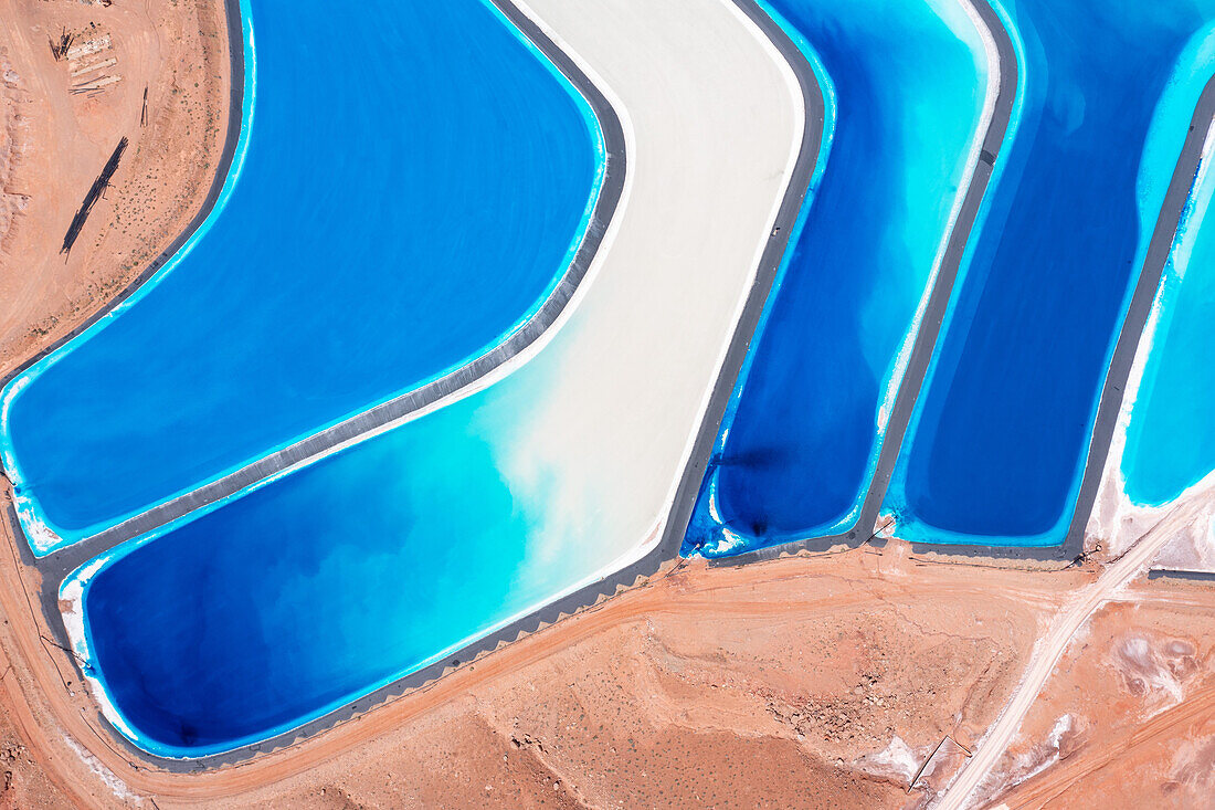 Evaporation ponds at a potash mine using a solution mining method for extracting potash near Moab, Utah. Blue dye is added to speed up evaporation.