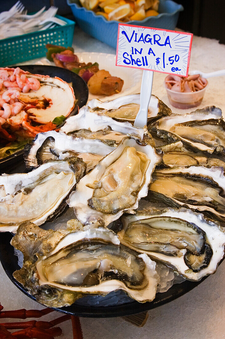 Viagra in a shell - fresh oysters for sale at fish market on Fisherman's Wharf, Monterey, California.