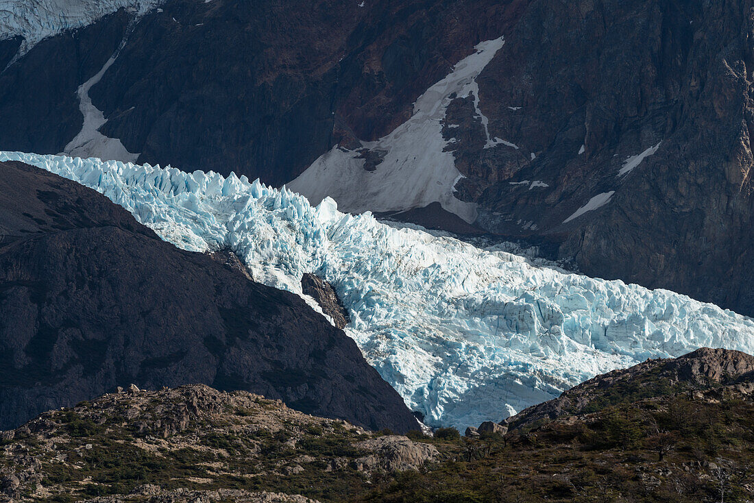 Sunlight on the Piedras Blancas Glacier at the base of Cerro Electrico in Los Glaciares National Park near El Chalten, Argentina. A UNESCO World Heritage Site in the Patagonia region of South America.