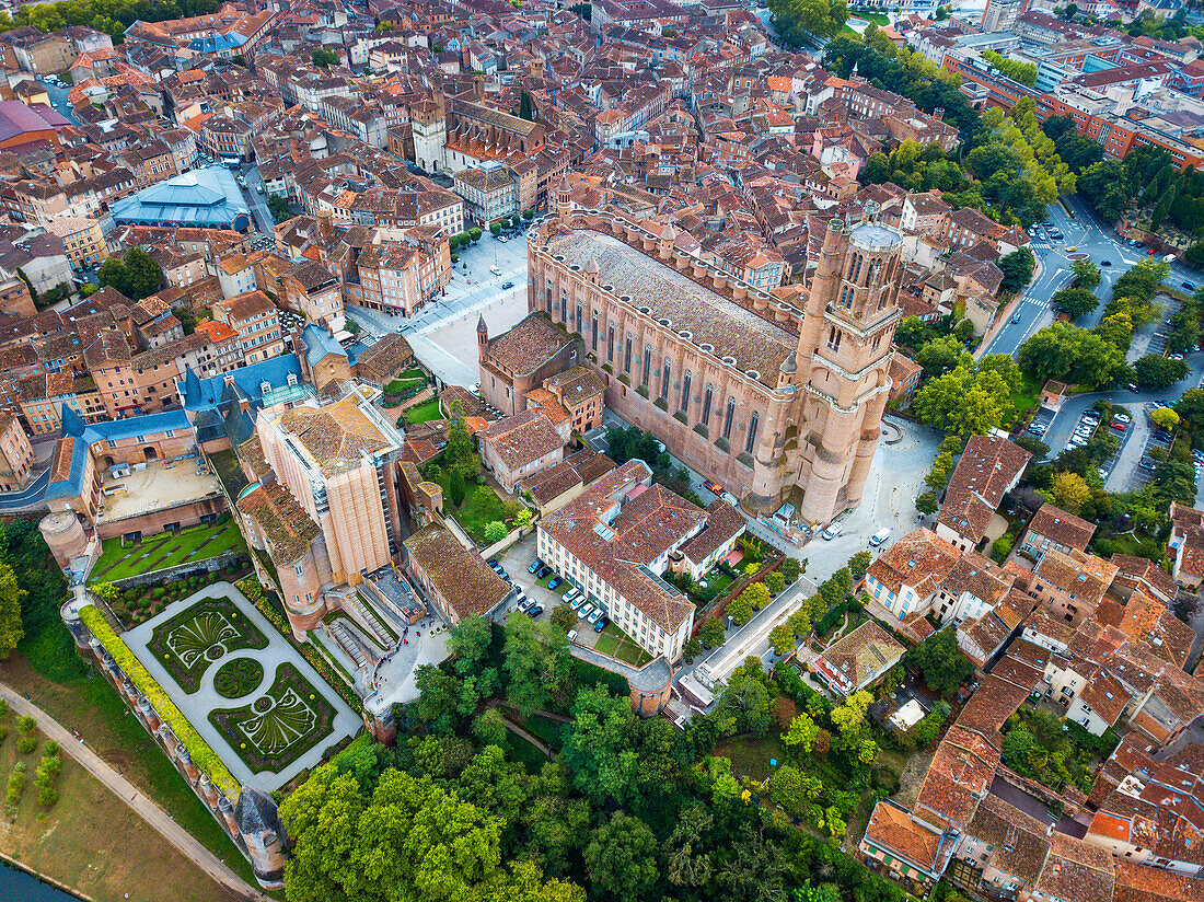 Gothic Saint Cecile Cathedral in Albi town. Pont Vieux bridge and the Church of Notre Dame du Breuil in Tarn village, Languedoc-Roussillon Occitanie Midi Pyrenees France.