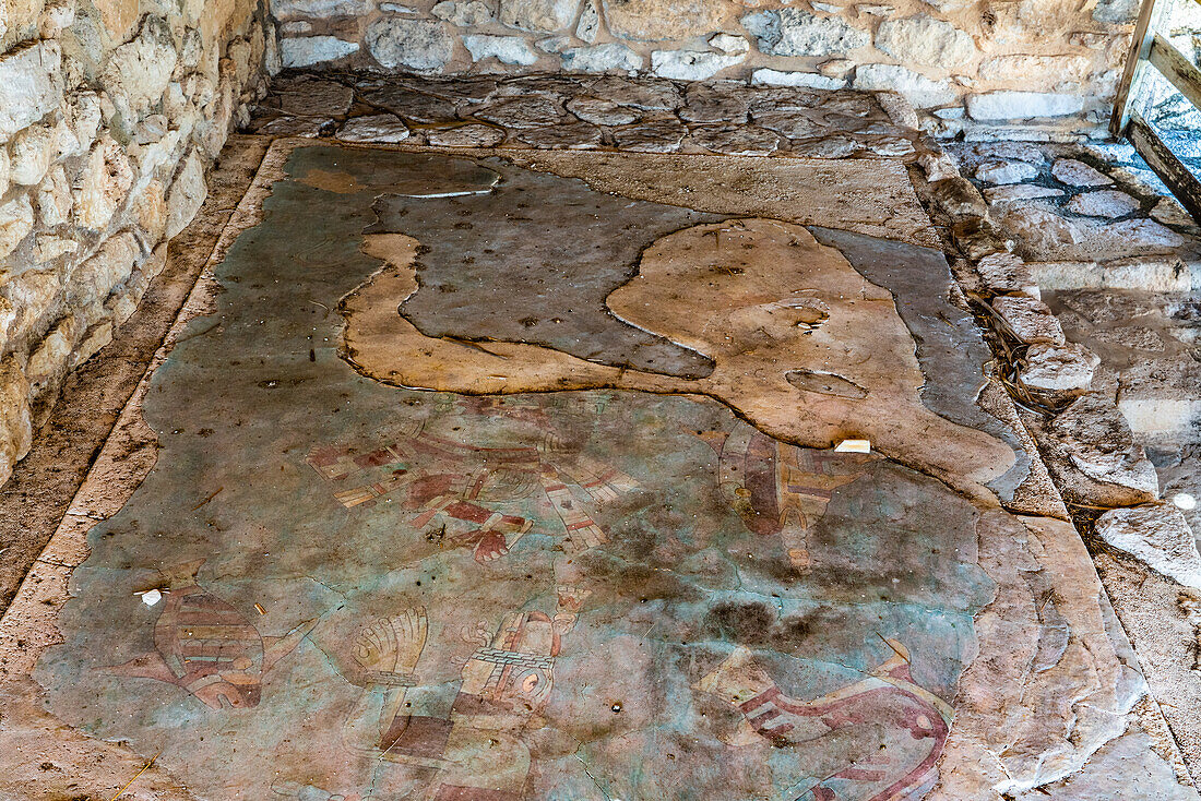 A painted mural on the floor of the Temple of the Fisherman or Temple del Pescador in the ruins of the Post-Classic Mayan city of Mayapan, Yucatan, Mexico.