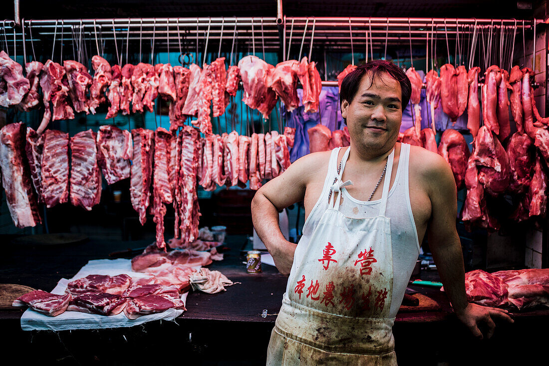 Meat vendor, Wet Market in Chun Yeung Street, Hong Kong Island, Hong Kong, China