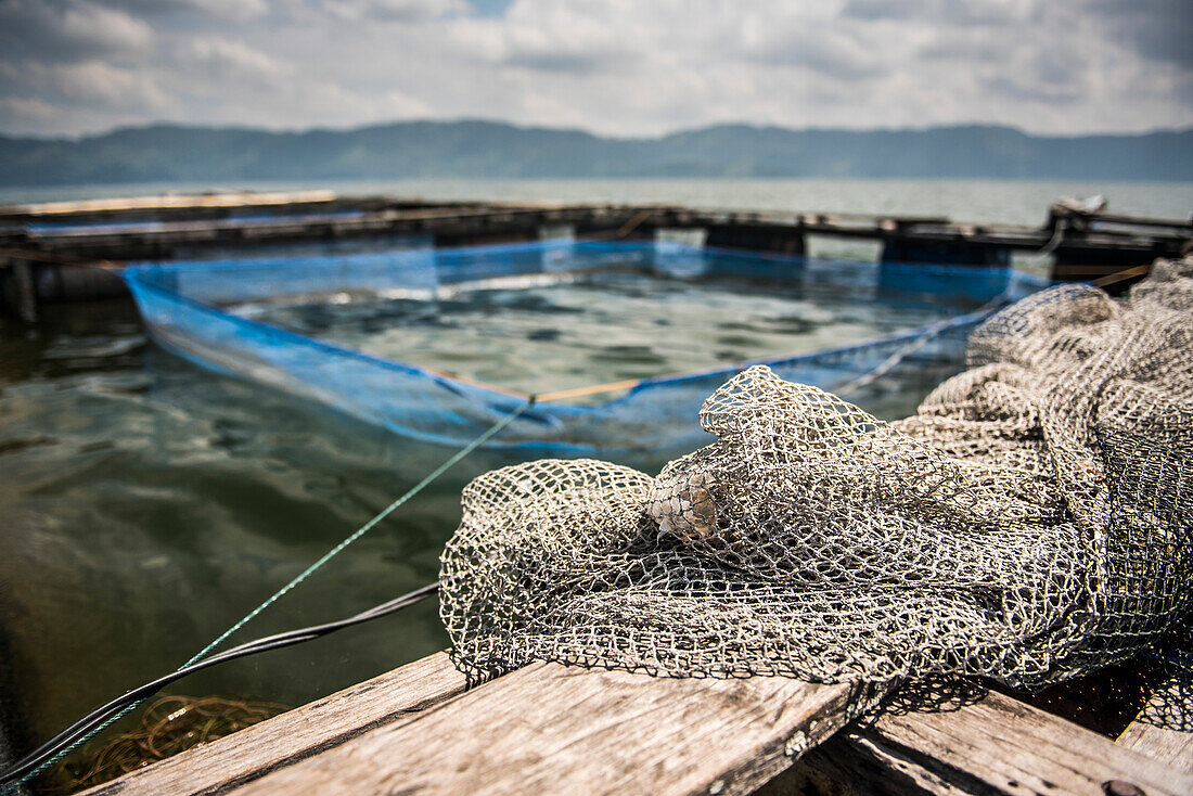 Fish farm in the middle of Lake Toba (Danau Toba), North Sumatra, Indonesia