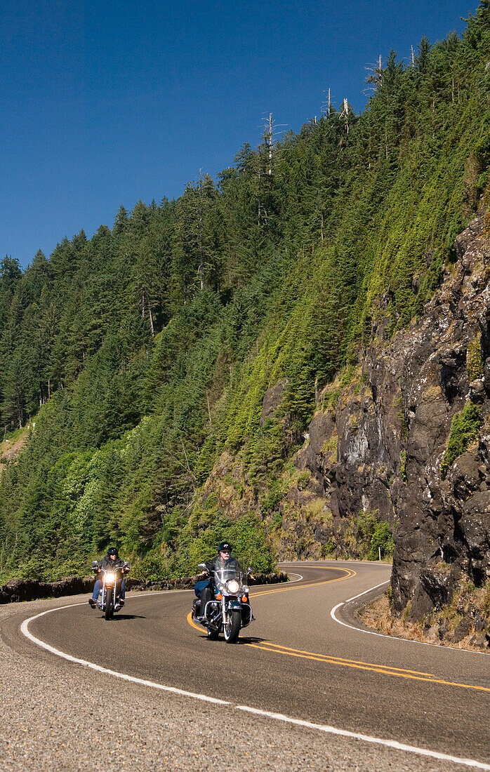 Motorcyclists riding on Highway 101 at on the Oregon Coast.