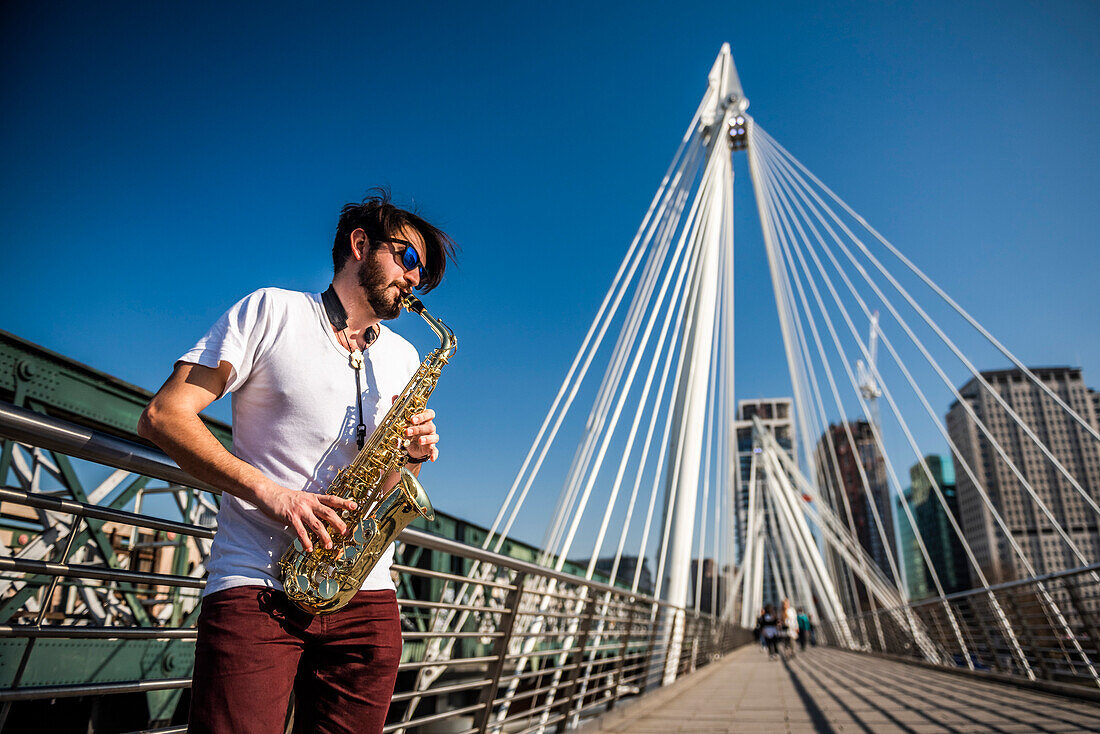 Golden Jubilee Bridge street scene, South Bank, London, England