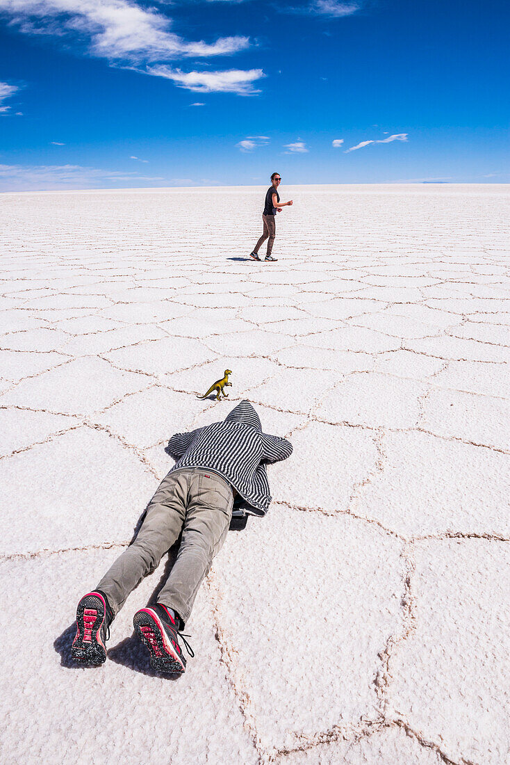 Taking perspective photos at Uyuni Salt Flats (Salar de Uyuni), Uyuni, Bolivia