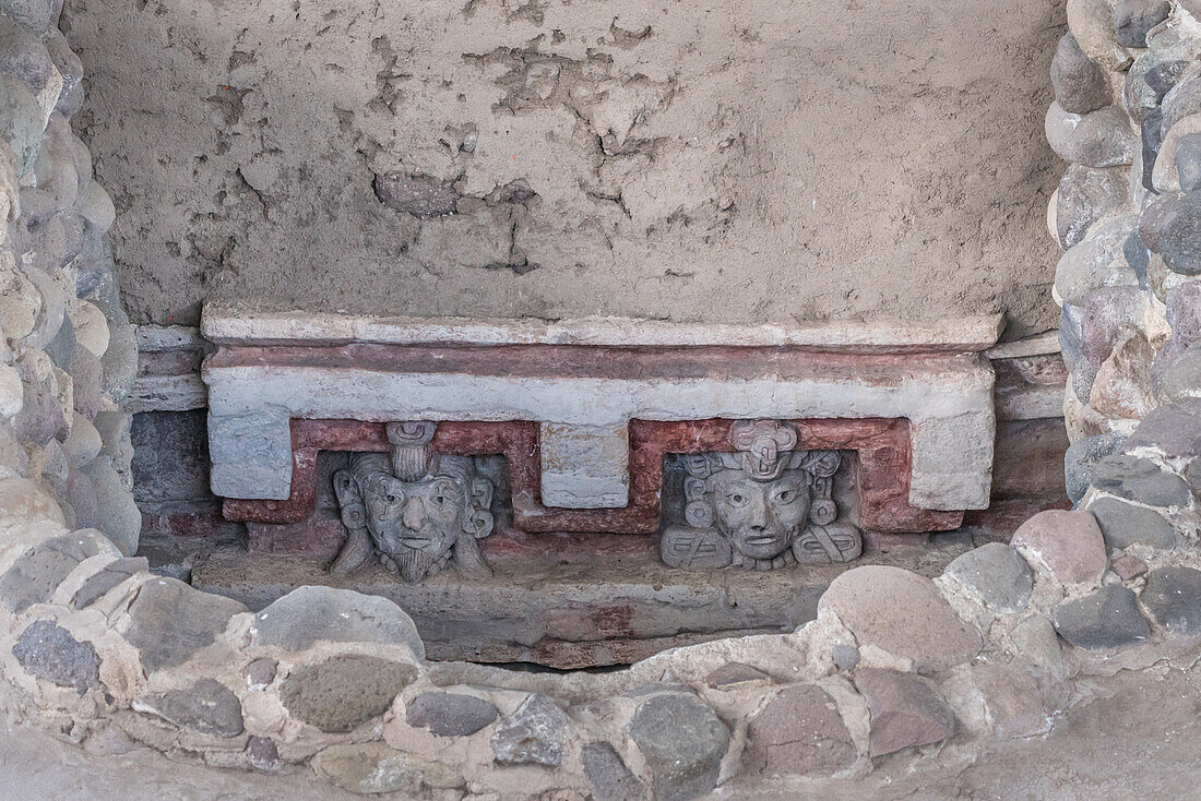 Stucco reliefs depicting ruler Lord 1 Earthquake and his wife, Lady 10 Cane, in the entrance to Tomb 6 in the pre-Hispanic Zapotec ruins of Lambityeco in the valley of Oaxaca, Mexico.