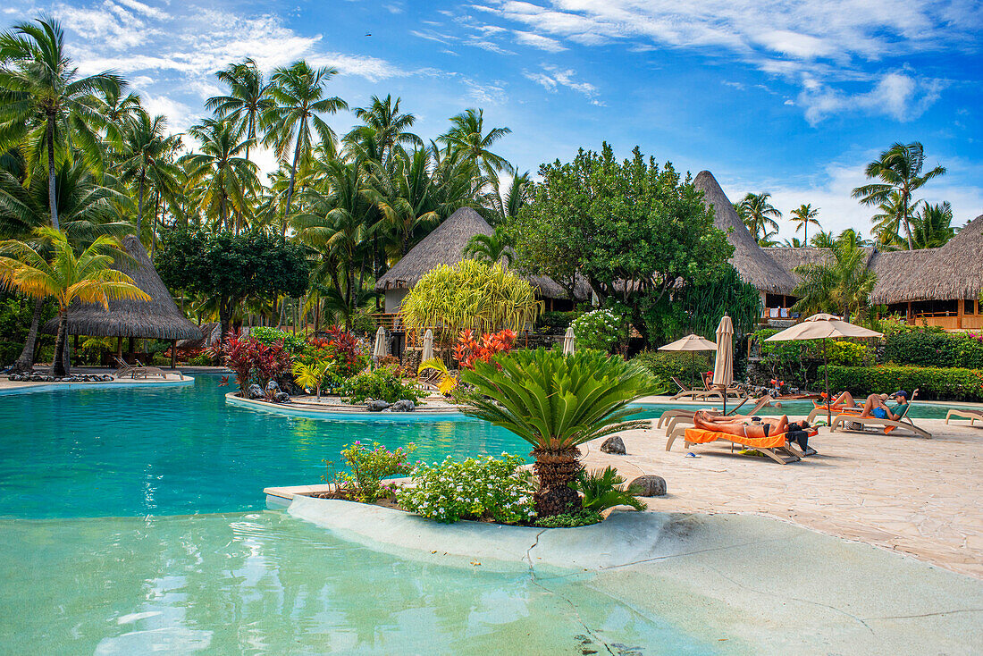 Pool of Le Bora Bora by Pearl Resorts luxury resort in motu Tevairoa island, a little islet in the lagoon of Bora Bora, Society Islands, French Polynesia, South Pacific.