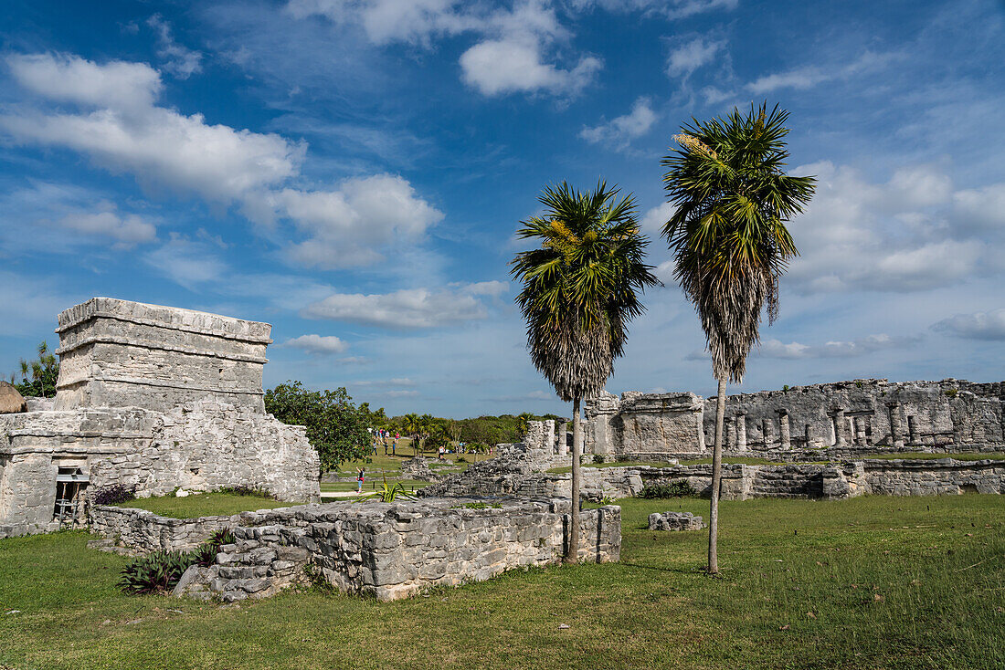 The House of the Columns in the ruins of the Mayan city of Tulum on the coast of the Caribbean Sea. Tulum National Park, Quintana Roo, Mexico. At left is the Temple of the Frescos.