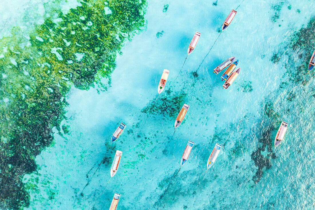 Aerial view of anchored boats in the exotic blue lagoon, Zanzibar, Tanzania, East Africa, Africa