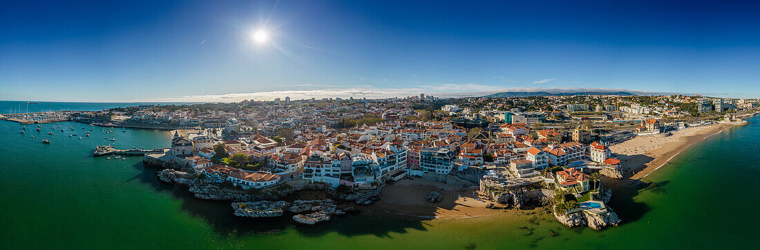 Aerial drone panoramic view of Cascais, on the Portuguese Riviera, in region known as the Green Coast due to the colour of the water, with beaches inclding Rainha, Duquesa and Conceicao, Portugal, Europe