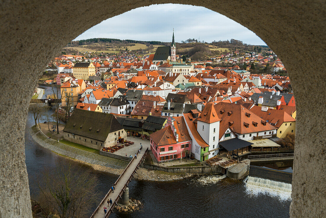 Historic town of Cesky Krumlov and Cesky Krumlov Castle Tower framed by window on Cloak bridge, UNESCO World Heritage Site, Cesky Krumlov, South Bohemian Region, Czech Republic (Czechia), Europe