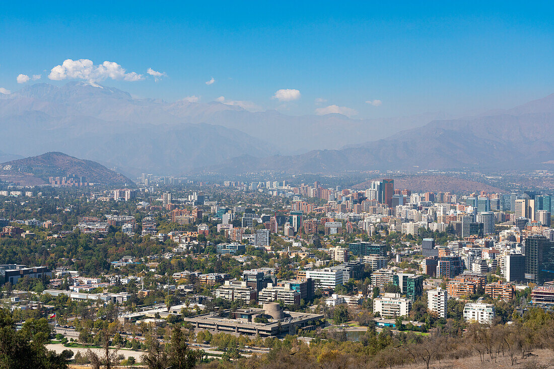 Vitacura and Jardin del Este neighborhoods seen from San Cristobal Hill (Metropolitan Park) with Andes in background, Santiago Metropolitan Region, Chile, South America