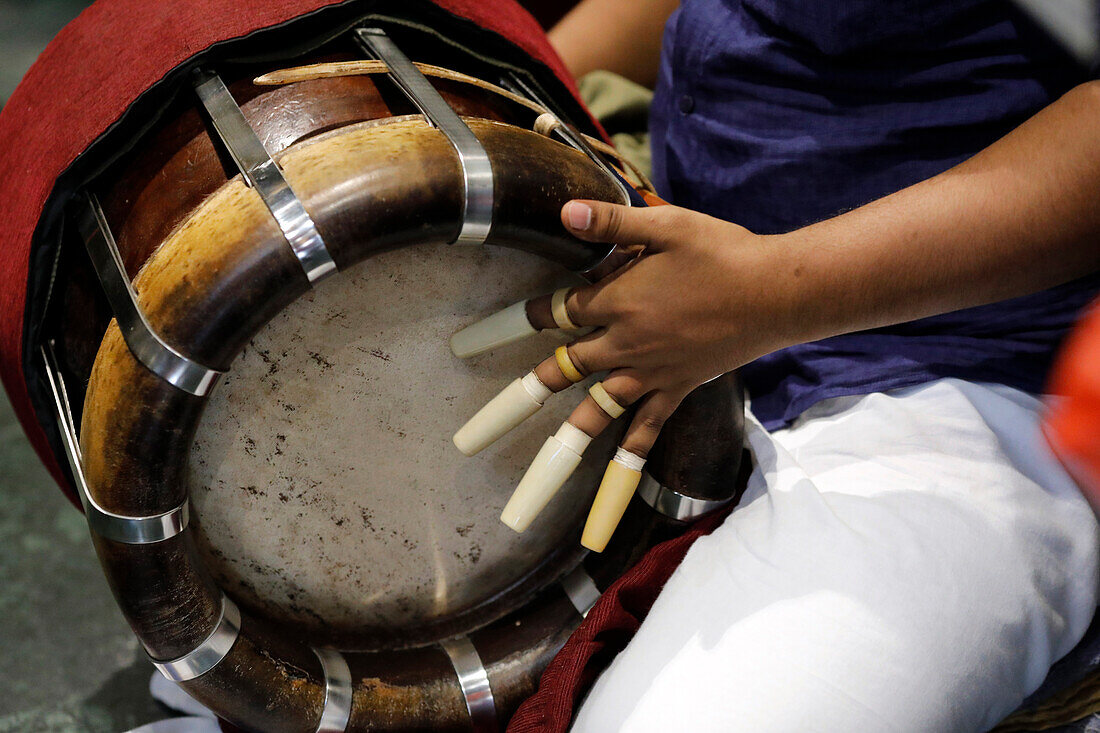 Sri Krishnan Hindu temple, musician playing a Thavil, a traditional Indian drum, Hindu ceremony, Singapore, Southeast Asia, Asia