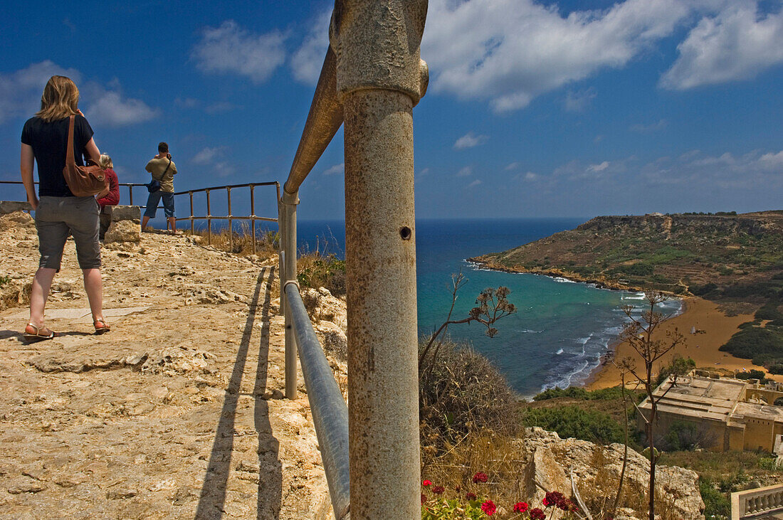 Tourists On Cliff Top At Calypso's Cave View Point