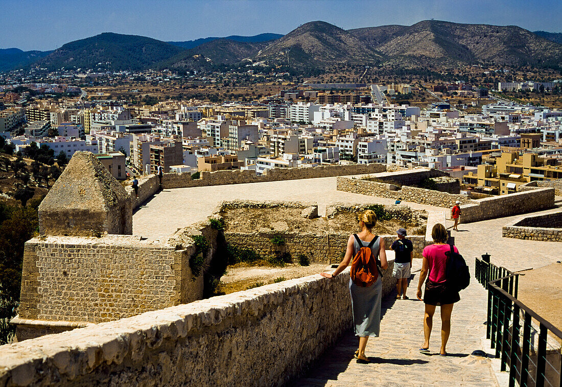 Tourists Walking Towards Ibiza Old Town