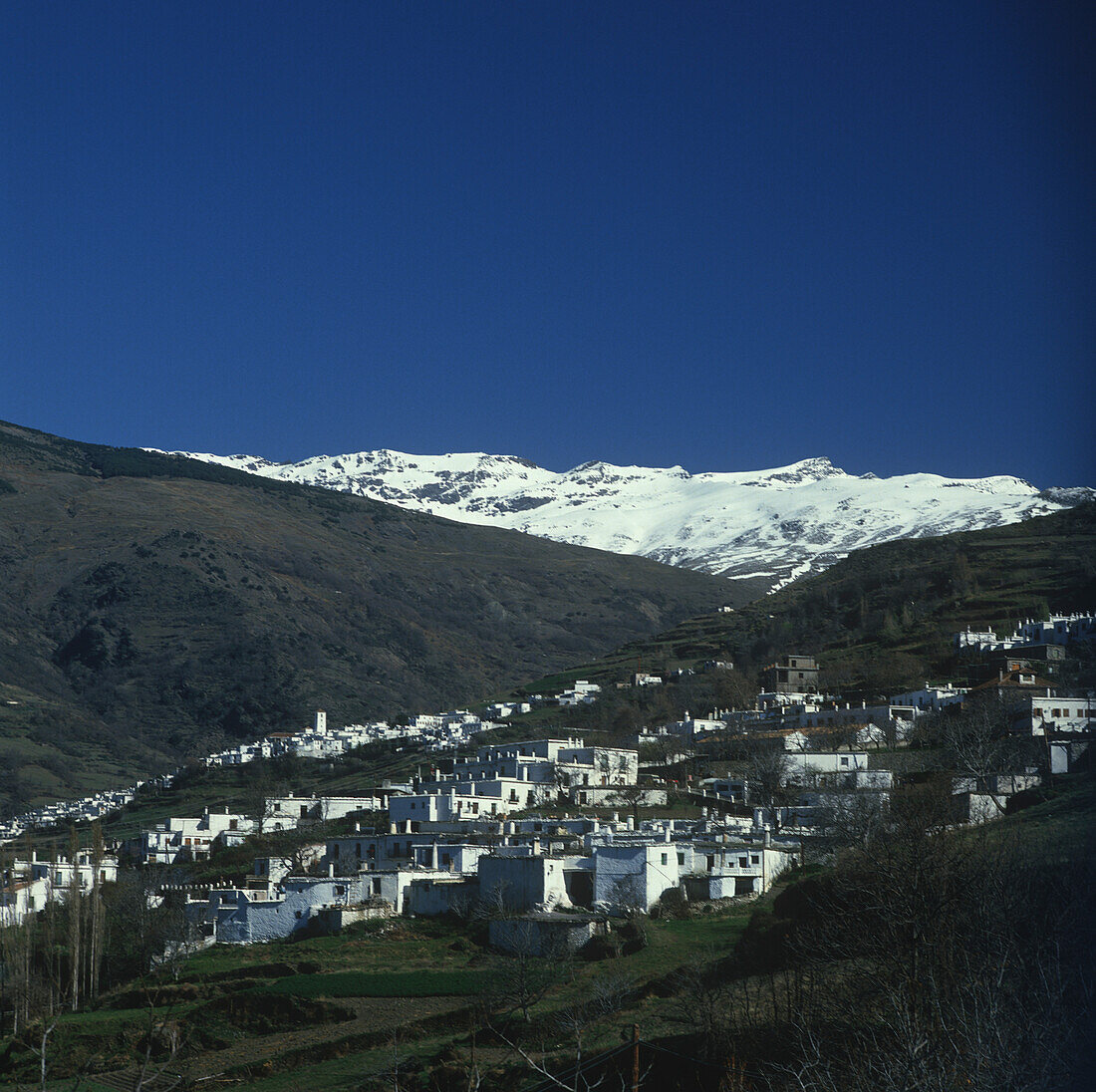 Pueblo Bianco Town In Snowcapped Sierra Nevada Mountains, Elevated View