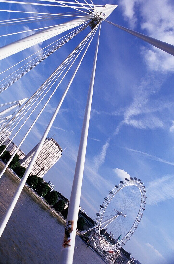 Tilted Low Angle View Of London Eye From Hunerford Bridge
