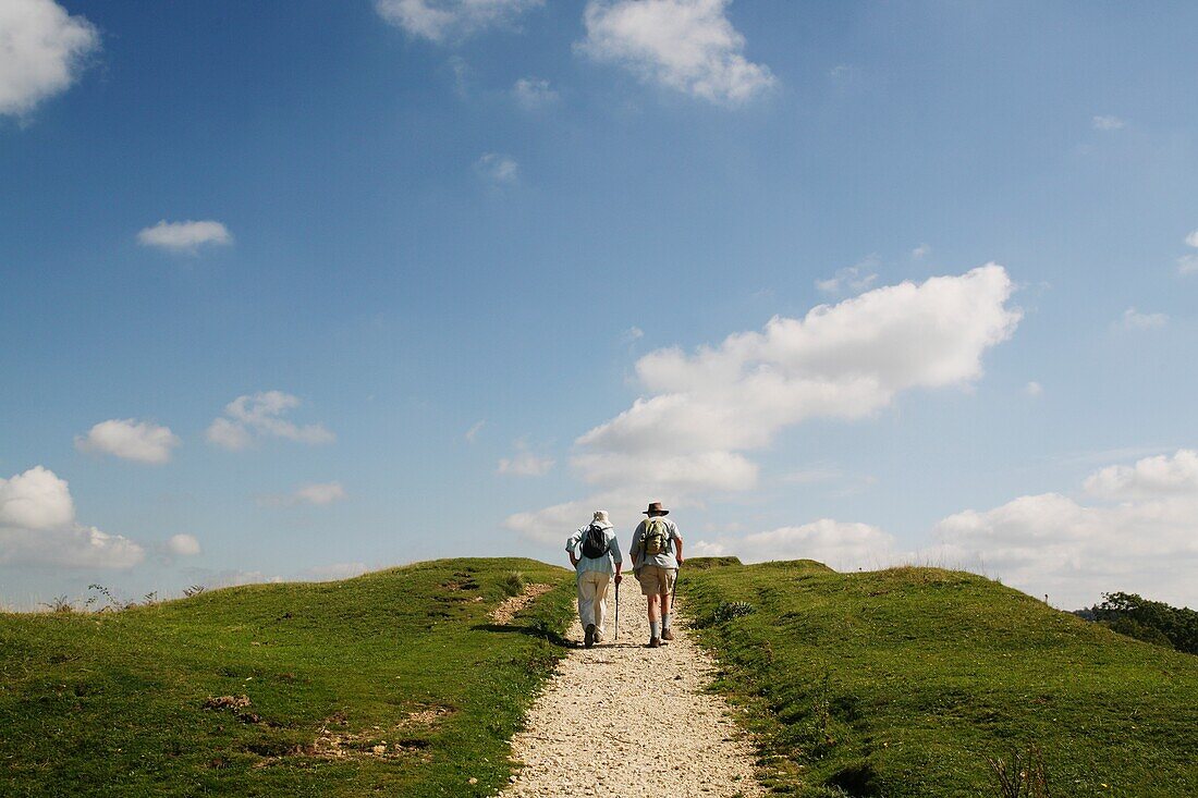 Hikers Walking Up Cam Long Down Hill