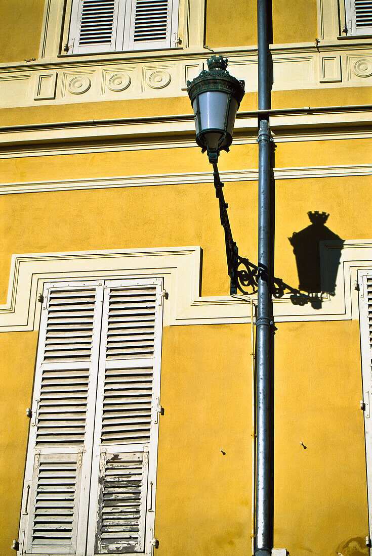 Window With Closed Shutters And Lamp Post, Close Up