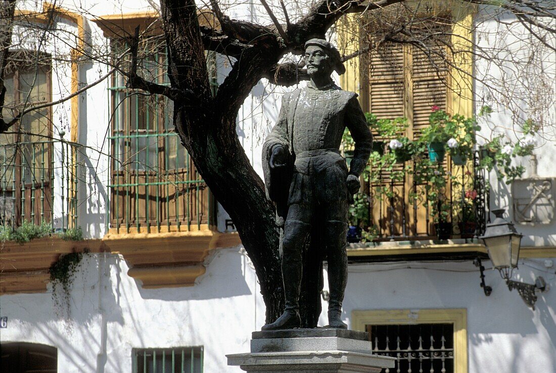 Statue In Front Of House