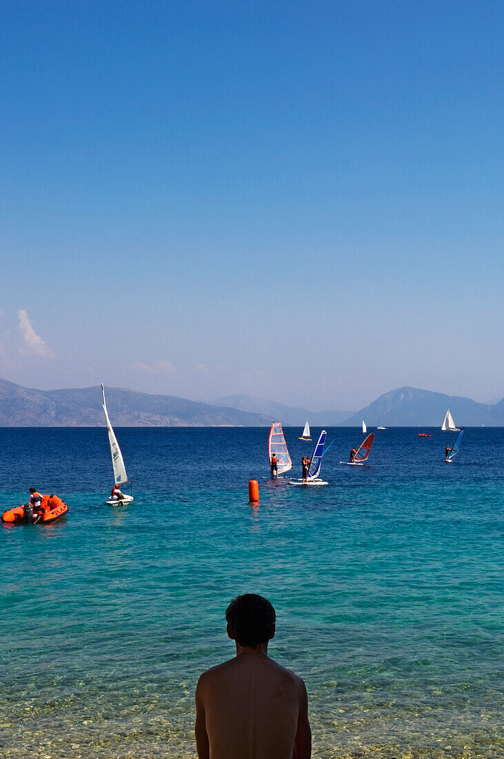 Man Watching People Windsurfing,Rear View, Lefkas,Ionian Islands,Greece