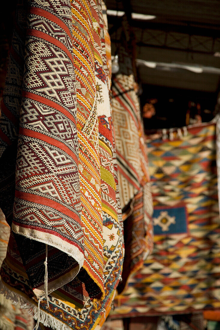 Carpets And Rugs Hanging Up In Stall In Souk, Marrakesh,Morocco