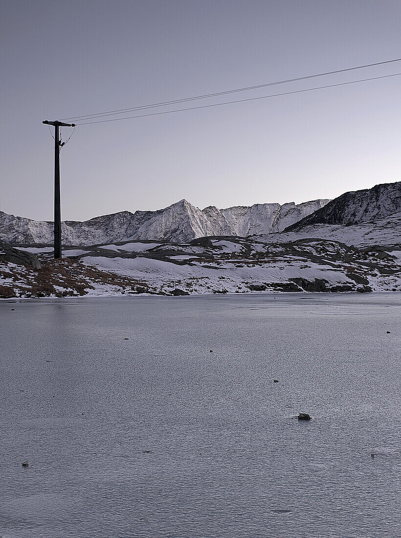 Frozen Lake With Melting Snow In Gothtard Pass, Switzerland