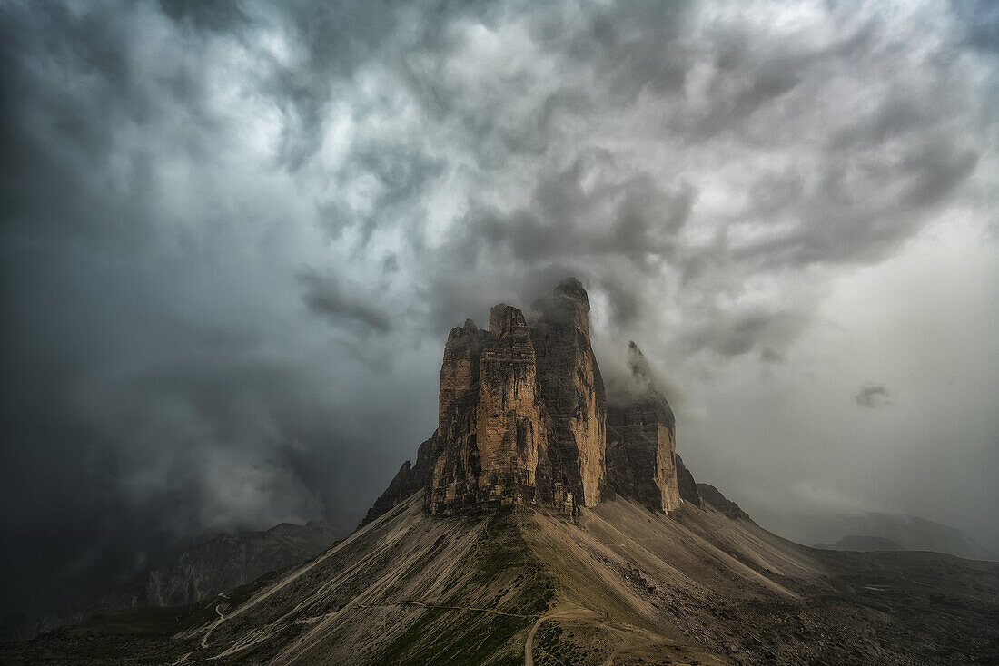 A Large Thunderstorm Looms Over Tre Cime In Natural Park Tre Cime In The Italian Dolomites; Italy