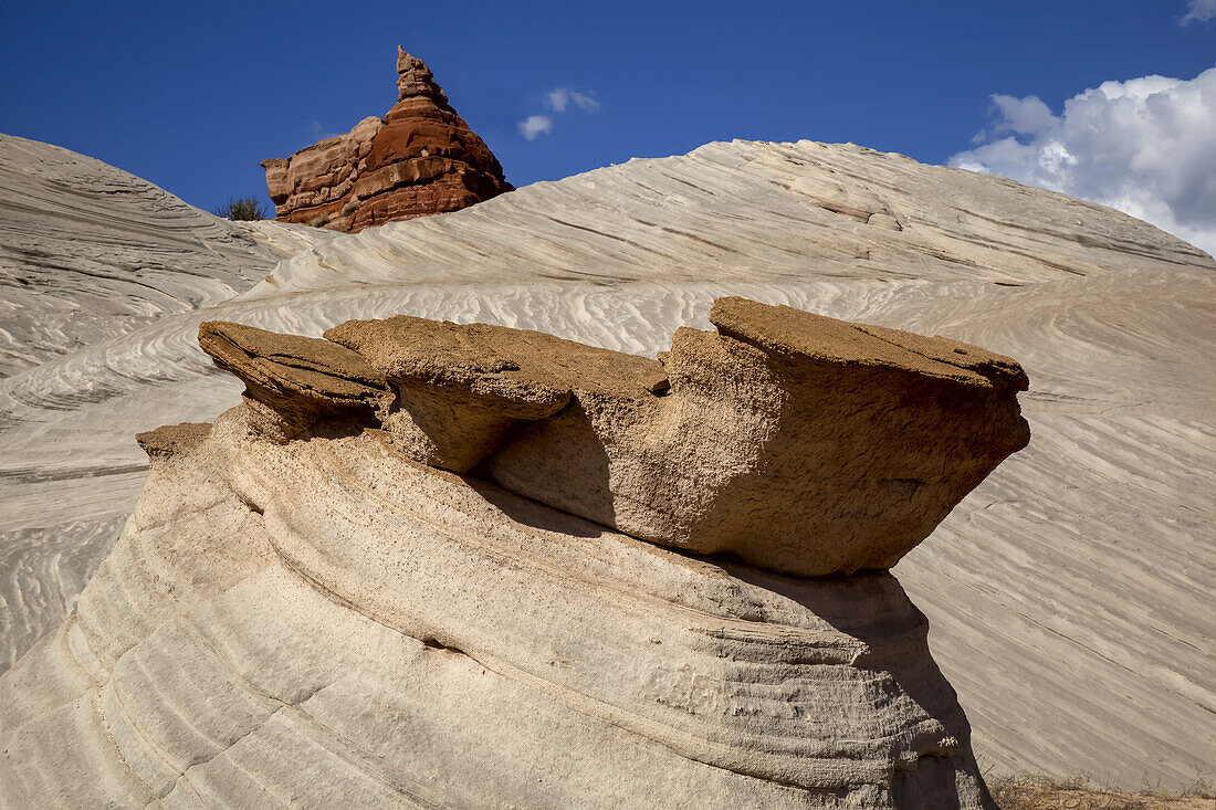 Close-Up Of Red And Tan Rock Formations In Paria Canyon Near Kanab, Utah In Mid-Summer With Blue Sky And Clouds Beyond; Utah, United States Of America