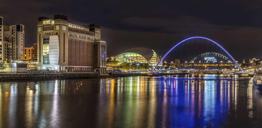 Reflections of Newcastle Gateshead quayside in the River Tyne; Gateshead, Tyne and Wear, England